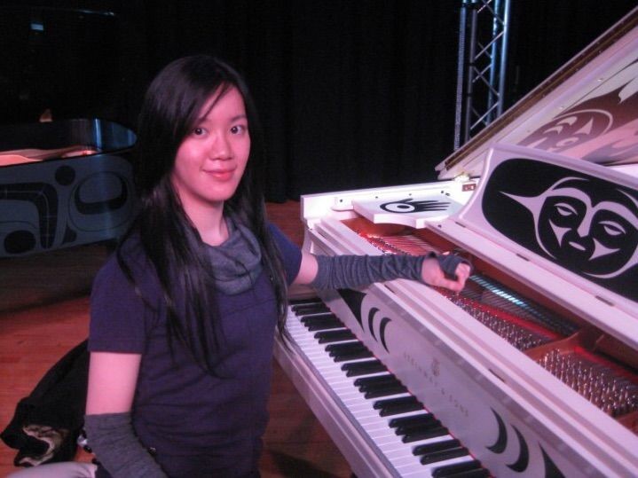 BAH Piano Teacher Josie with a limited edition Steinway with FIRST NATIONS artwork, in black and white.