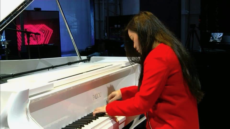 BAH piano Teacher Josie performs on the Fazioli Butterfly Piano